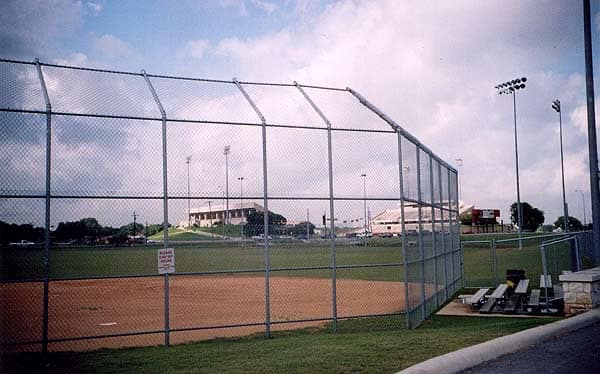 Chain link backstop at a baseball field